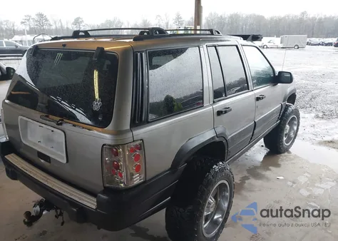 1997 Jeep Grand Cherokee Laredo/Tsi из США, поврежденный, VIN 1J4GZ58S7VC730737